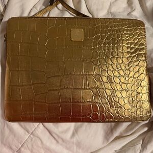 MCM gold crossbody/clutch- new without tags. COA included